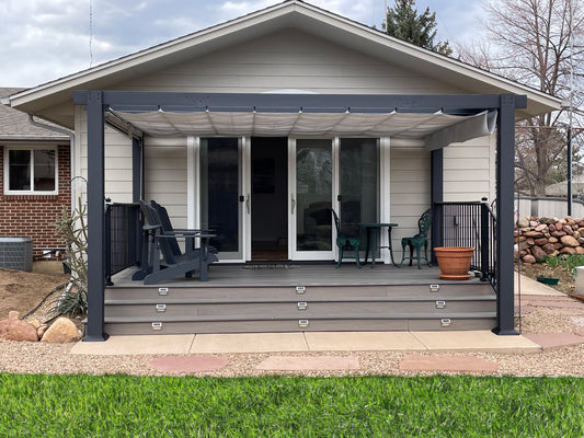 front facing view of a pergola installed to the front of a house porch