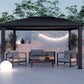 Cambridge Hard Top Gazebo at dusk with patio furniture and outdoor lighting underneath.