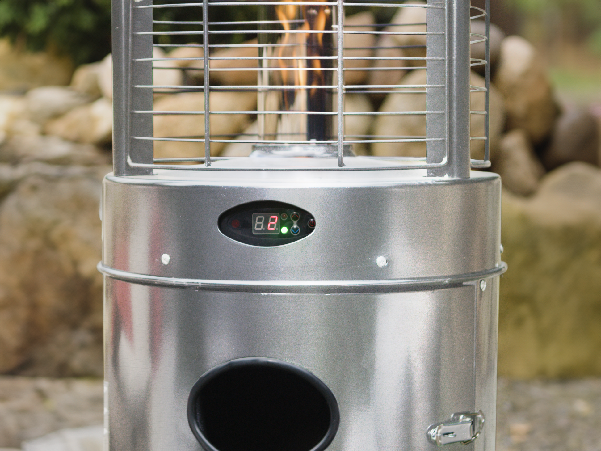 Close up of the Illume Patio Heater in Stainless Steel finish. Digital panel and visible flame can be seen.
