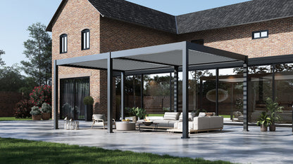 Lugano 12'x20' Louvered Pergola in backyard of large brick house