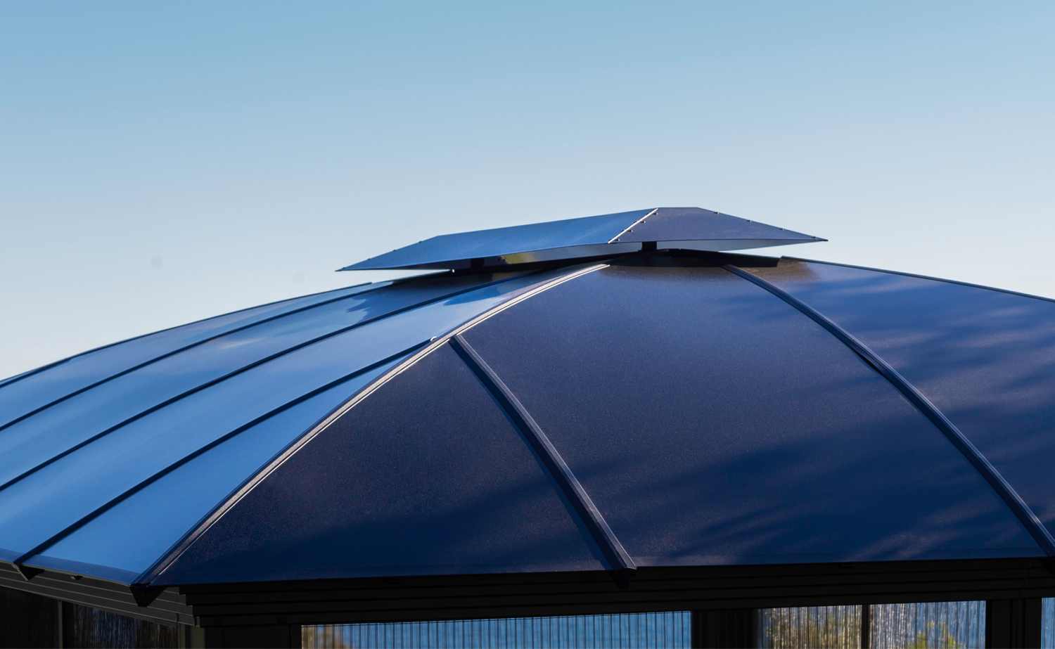 Close up of the Siena Hard Top Gazebo with dome-shaped roof and wind escapement at top