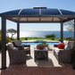 Cambridge Hard Top Gazebo on brick patio with outdoor furniture underneath.