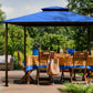 Kingsbury Soft Top Gazebo in Mediterranean Blue Canopy Roof with outdoor dining table.